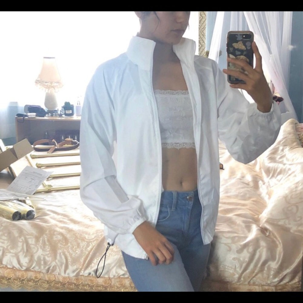 Sporty white windbreaker